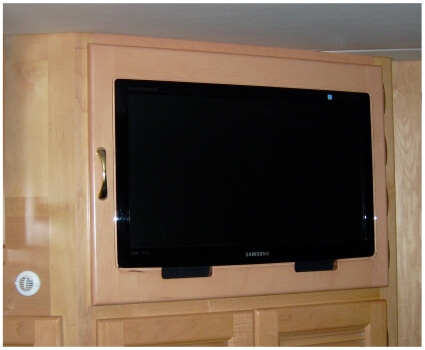 custom-bed-room-rv-cabinet Custom bedroom RV cabinet with mounted TV